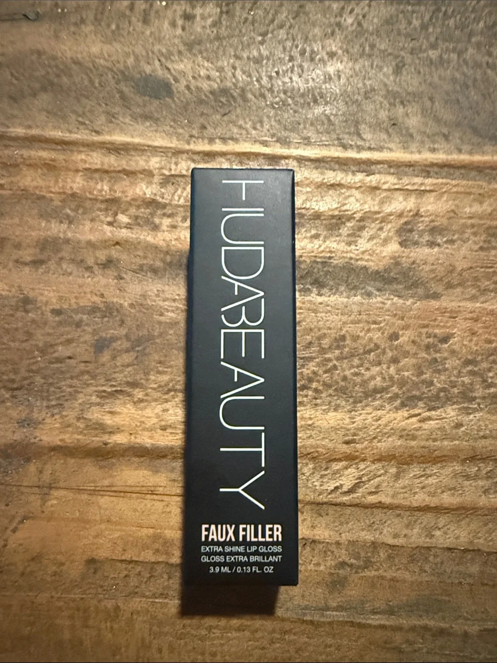 HUDA BEAUTY Faux Filler Extra Shine Lip Gloss - Black Packaging
